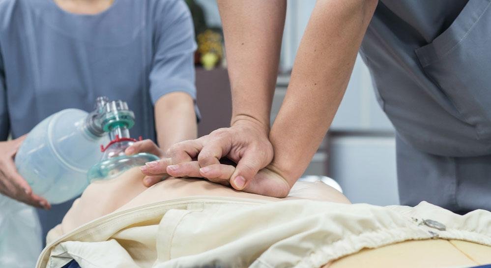 Chest compressions and bag-mask ventilation practiced on a training manikin